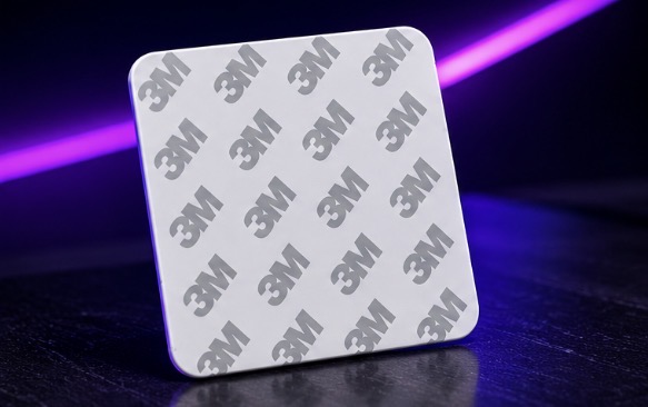 Peel and stick 3M adhesive backing on the PLD Tap-to-Review card